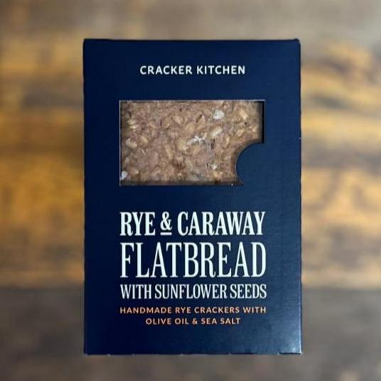 A packet of Cracker Kitchen Rye & Caraway Flatbreads.