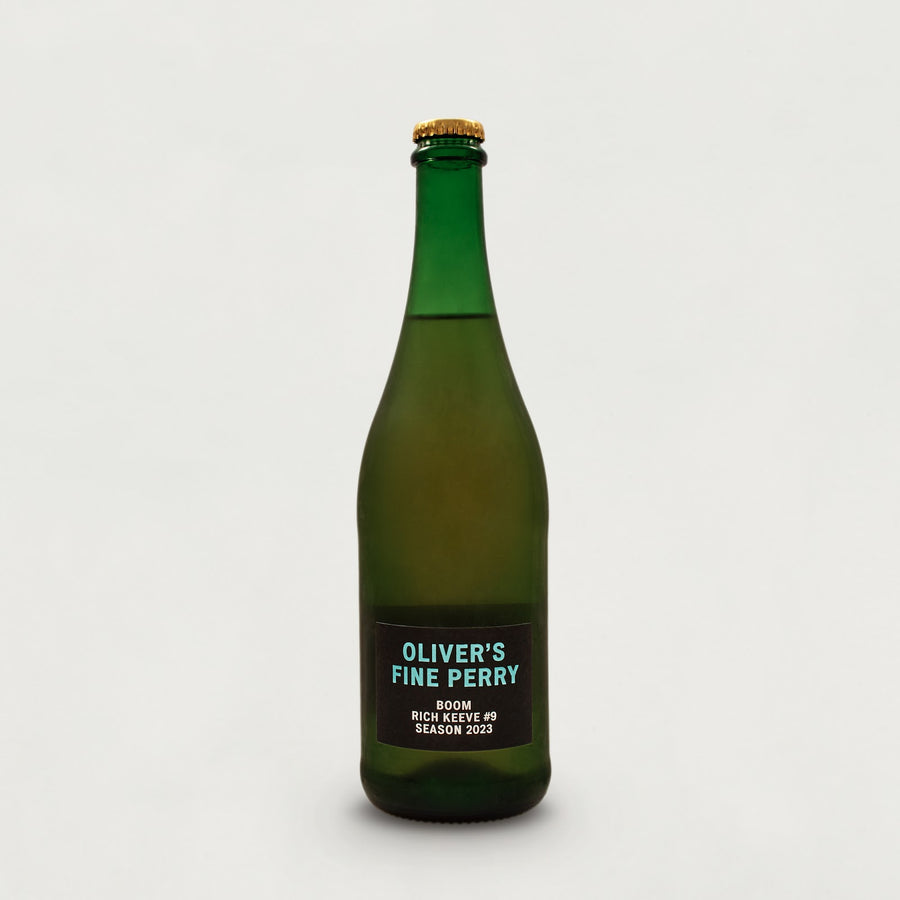 A 750ml glass bottle of Oliver's 'Boom' perry.